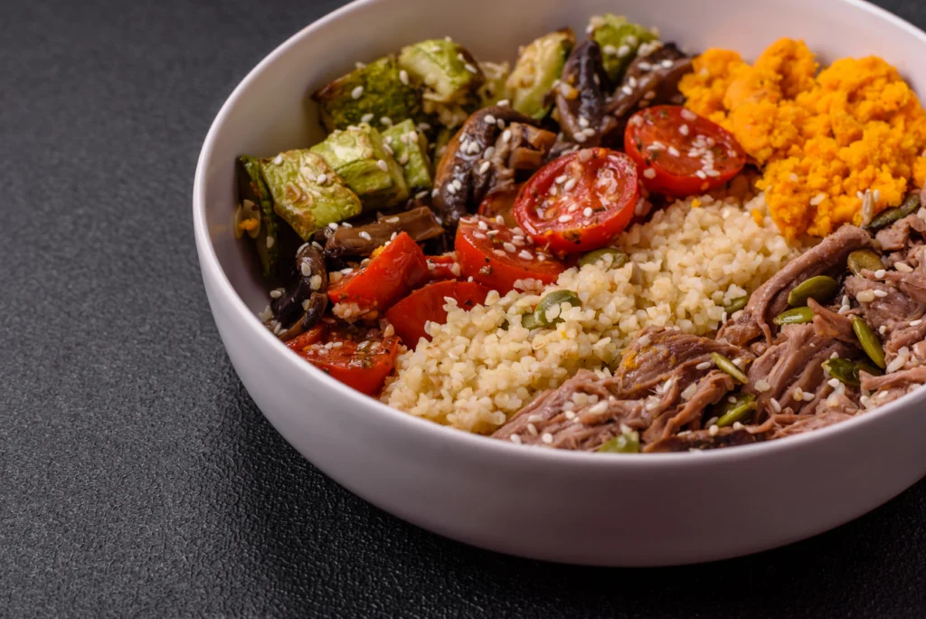 Bowl of Burger Recipe with Beef, Bulgur, Tomatoes, Mushrooms, and Zucchini A Flavorful Twist on a Classic